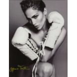 Mario Testino (Peruvian, b.1954). Jennifer Lopez, photograph, signed lower right, framed, 14 x 18cm