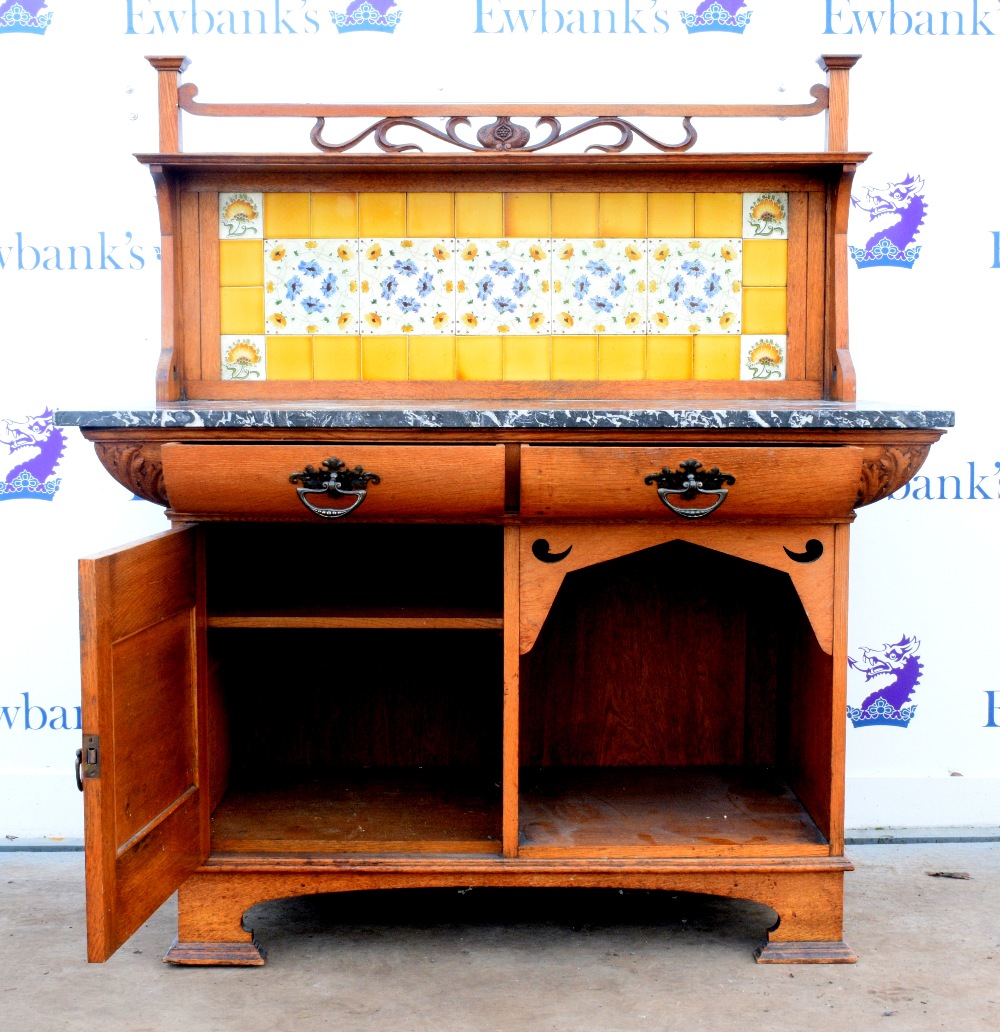 Art Nouveau oak washstand, the carved gallery with foliate decoration above a yellow tiled back, - Image 3 of 6