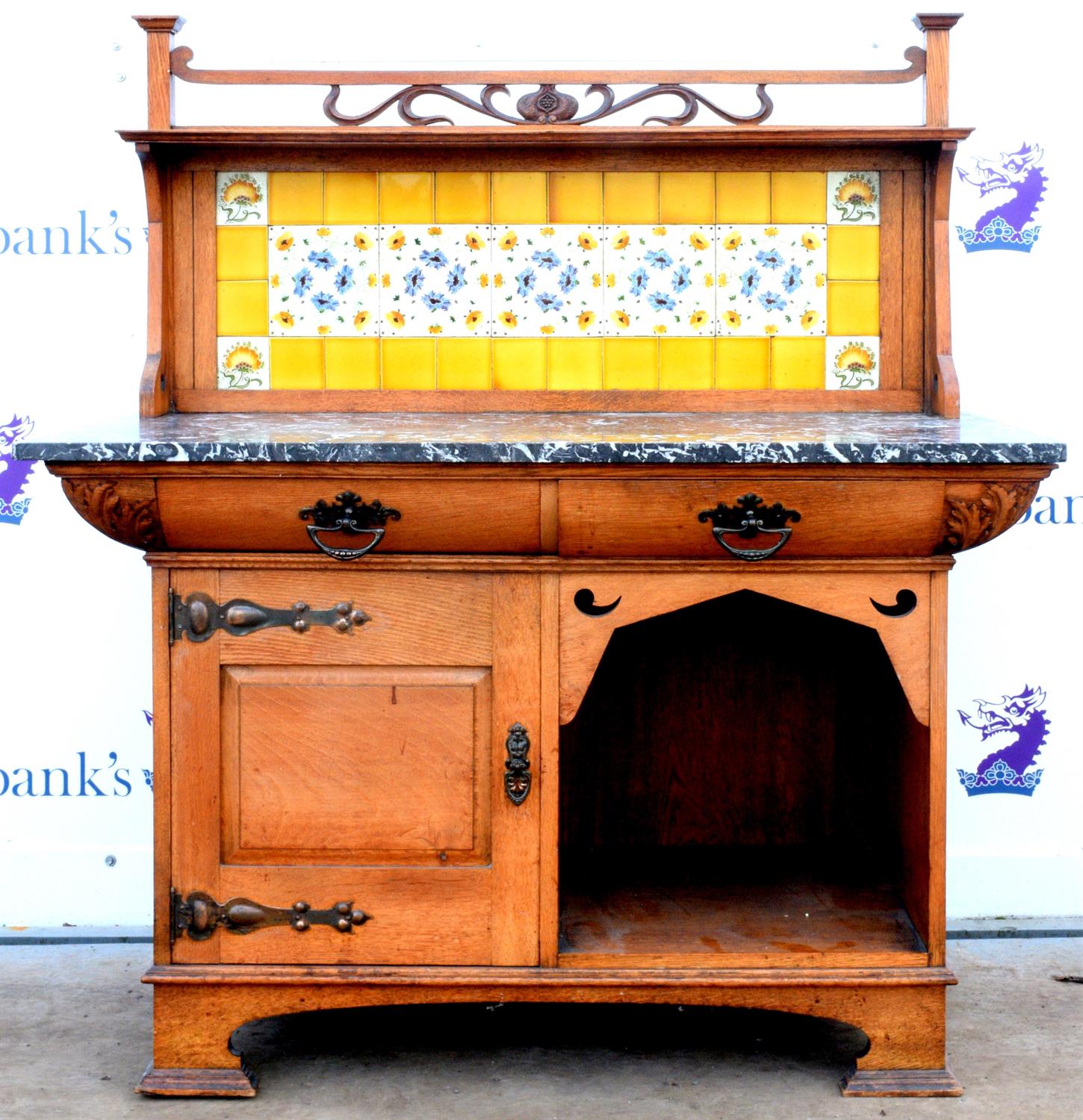 Art Nouveau oak washstand, the carved gallery with foliate decoration above a yellow tiled back, - Image 4 of 6