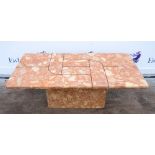 1970s Pink composite marble pedestal coffee table with inset geometric design, base measures 60 x