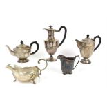 Quantity of white metal items to include cups, sauce boat, galleried tray, teapots etc.