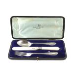 Cased silver three piece christening set by Walker and Hall, Sheffield 1922