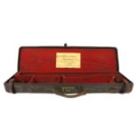 Antique leather gun case with fitted interior, bearing label for 'Henry Atkin Ltd., Gun Makers,