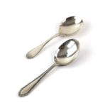 Two silver caddy spoons, one Birmingham the other French