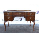 20th century walnut and mahogany crossbanded dressing table, with serpentine front above an