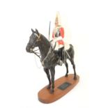 Beswick Connoisseur 'Lifeguard' Model on wooden plinth