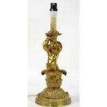 Messenger & Sons brass table lamp in the form of a cherub holding aloft a basket,