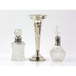 Two silver necked perfume bottles and a silver posy vase with pierced decoration