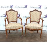 Pair of 20th century walnut fauteuil with floral upholstery, on cabriole legs
