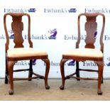 Pair of Queen Anne style walnut dining chairs with drop in seats, turned stretchers and shaped