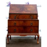 20th century walnut bureau the fall front with fitted interior above three long drawers on cabriole