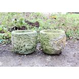 Pair of composite stone pots, relief carved with animals and scrolling foliage, H26cm Diameter 30cm