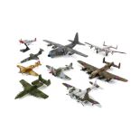 Three Corgi die-cast model aircraft, comprising C130 Hercules, Avro Lancaster in silver and red and