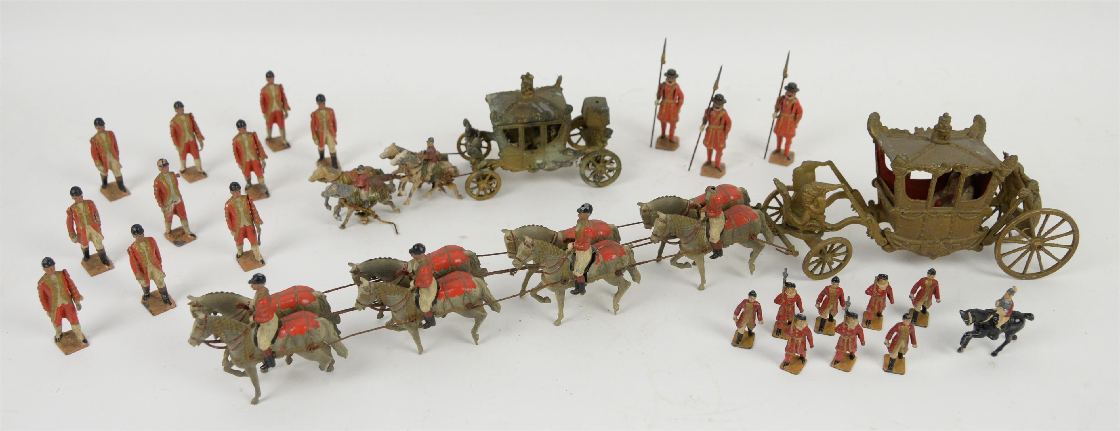 Britains cast metal model State Coach with attendants and a smaller scale Hill Co.