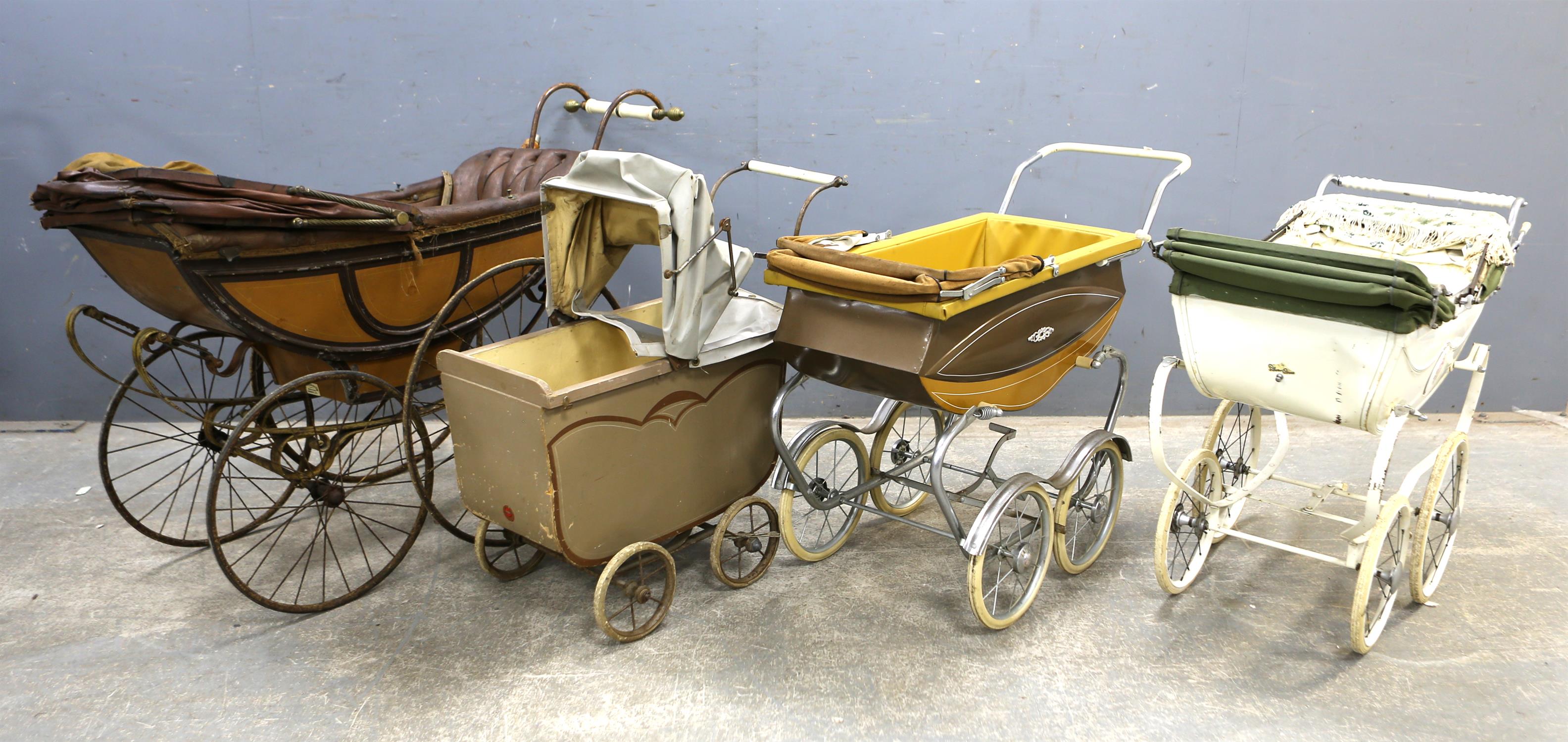Simmons & Co., metal sprung, wood and leather dolls pram with metal spokes and solid rubber tyres,