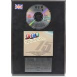 BPI award presented to Box Music Ltd. to recognise sales in the United Kingdom of more than 300,