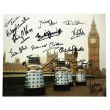 Dr Who - Three signed items, consisting an 8x10 inch still signed by twelve members of the cast &