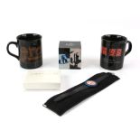 A collection of music tour memorabilia - including Depeche Mode and Erasure mugs,