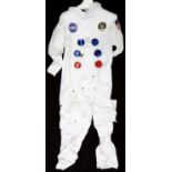 NASA Apollo 11 astronaut costume including suit with red and blue valves, Apollo 11 badge and US