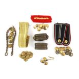 A large collection of 500 + period, military and vintage buttons, badges and epaulettes.