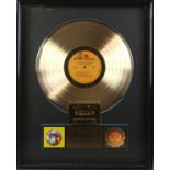 The Jimi Hendrix Experience- Gold disc for Are You Experienced? A mounted and framed presentation