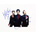 Green Day - Colour photo print signed by the American Rock band, 10 x 8 inches.