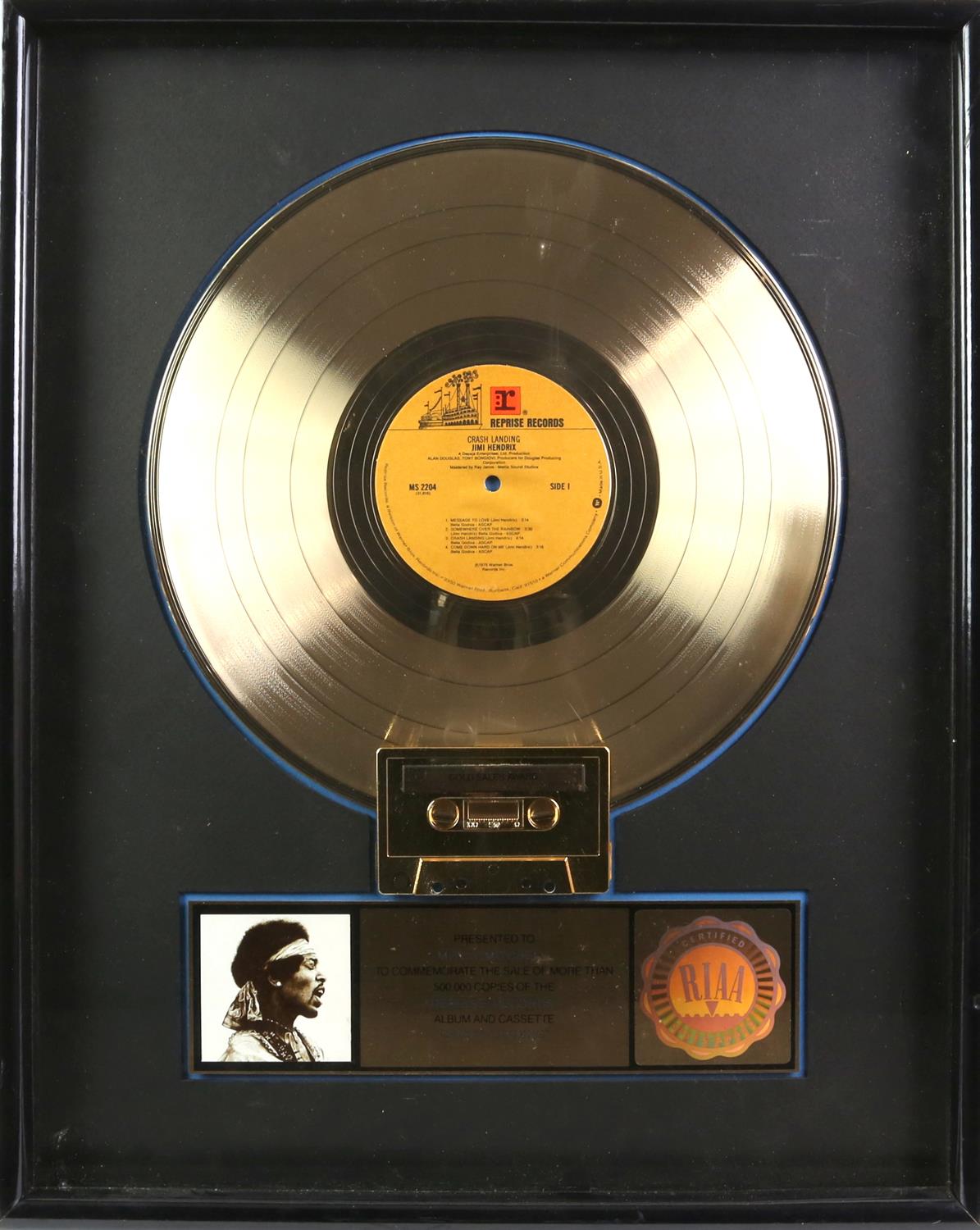 The Jimi Hendrix Experience- Gold disc for Crash Landing. A mounted and framed presentation disc,
