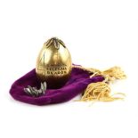 Harry Potter and the Goblet of Fire (2005) a golden Triwizard tournament egg with pewter Chinese