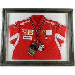 Formula One - Ferrari Official Team shirt from 2005 framed with passes & lanyard, 29 x 36 inches.