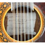 The Beatles - EKO 12 guitar signed by George Harrison on interior label with padded case,