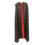 Vampire cape, black polyester, lined in red, Western Costume Company label inside neck with