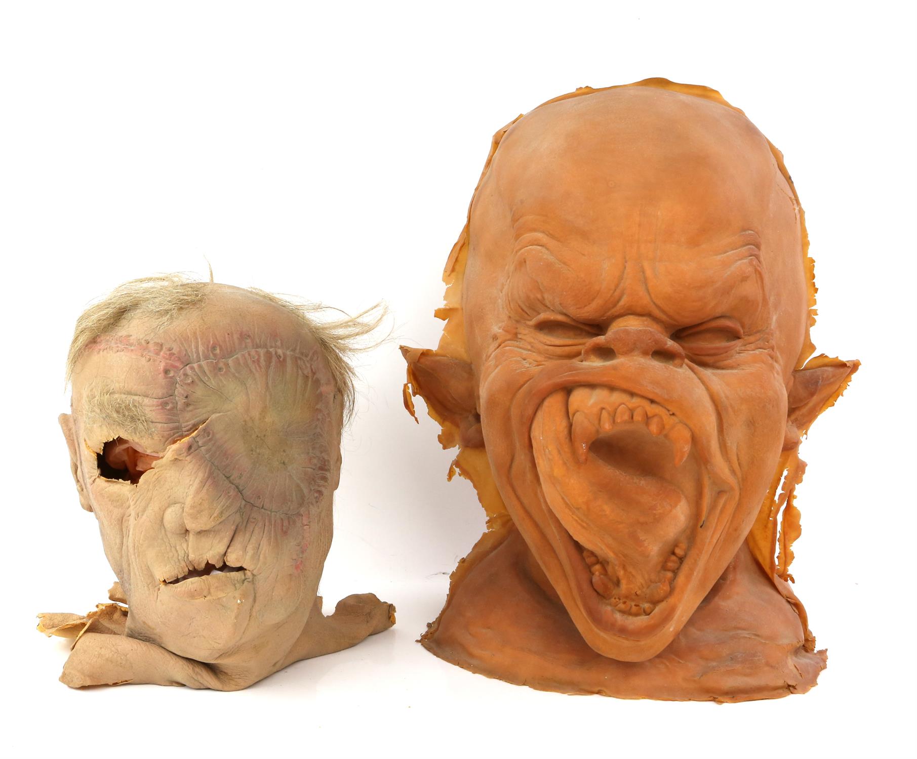 Two Horror masks including a foam latex demon bust designed by artist Mark Alfrey and another