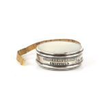 William IV silver and mother-of-pearl sewing tape measure, stamped 'Chesterman Patent Sheffield',