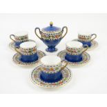 Wedgwood set of five coffee cans and saucers, and a twin handled sucrier with cover,