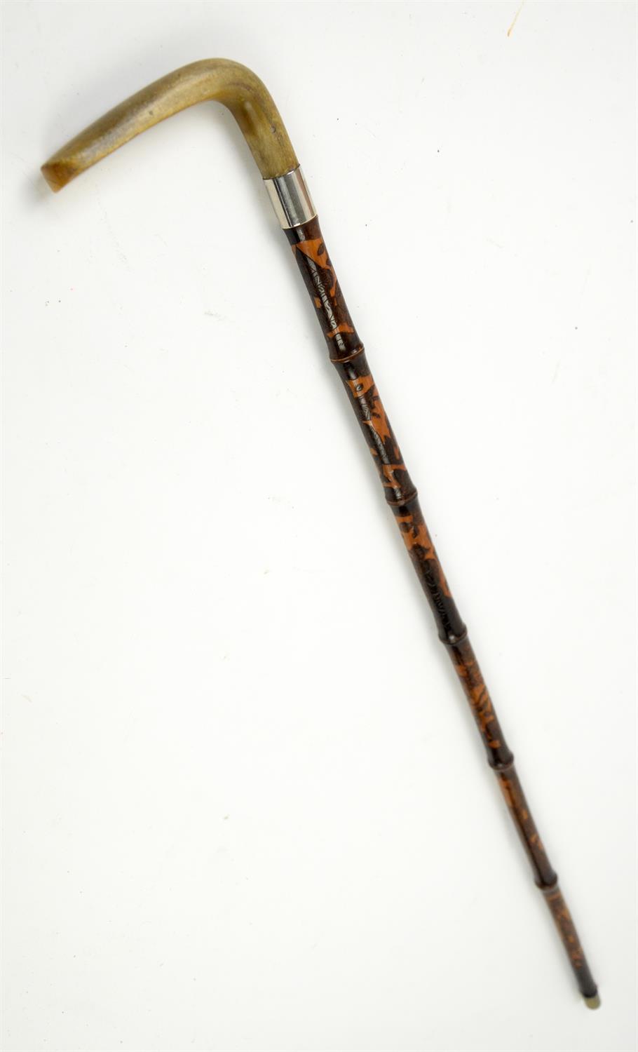 Late 19th/early 20th century swordstick, with carved horn handle and the cane sheath carved