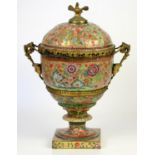 Large 19th century porcelain urn with cover in a chinoiserie style, ornately decorated with