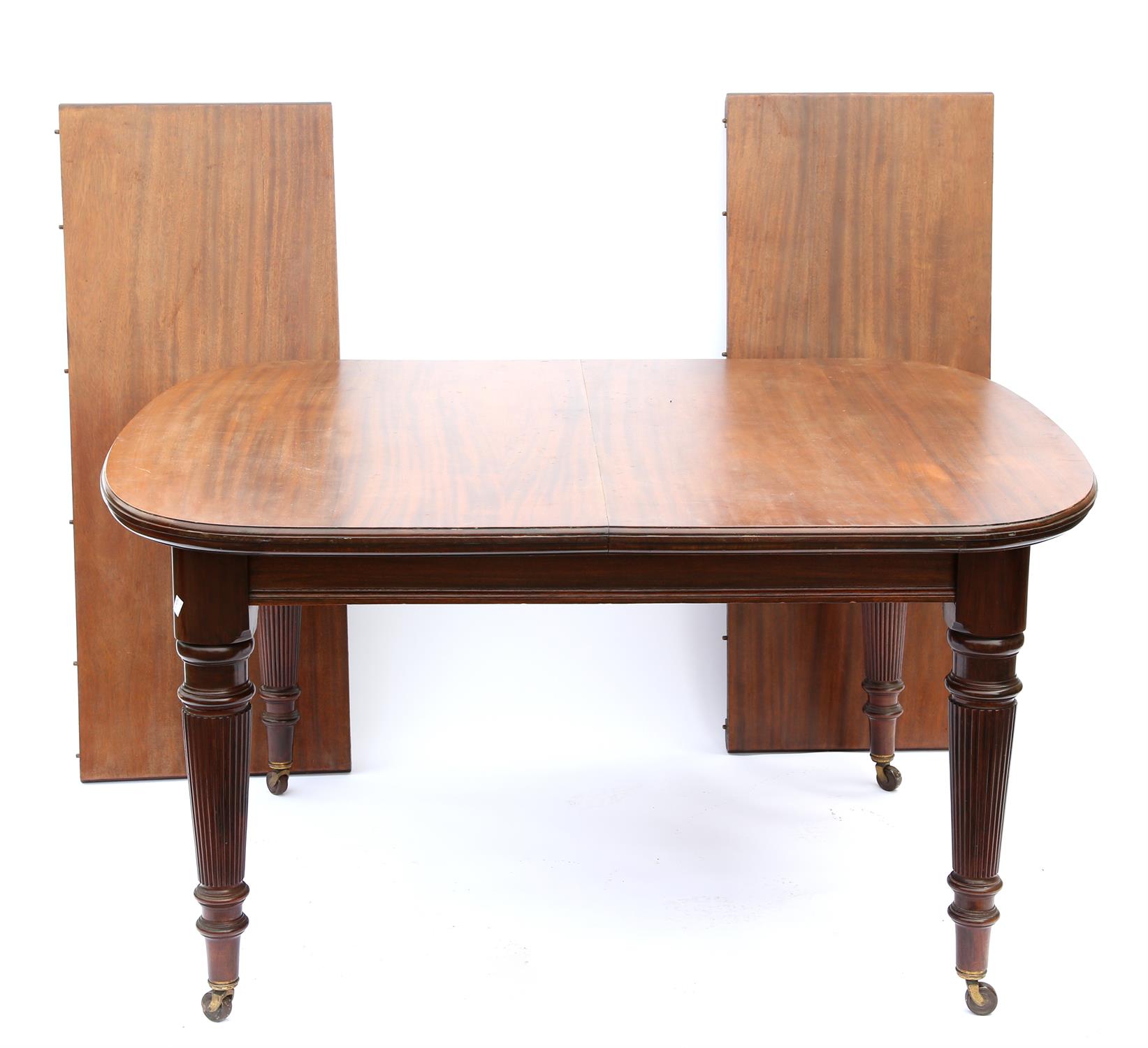 Late 19th century mahogany extending dining table, with reeded tapering legs on castors, - Image 2 of 2