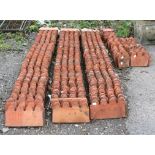 Garden border terracotta edging tiles, comprising 230 full length tiles, 25 three-quarter length