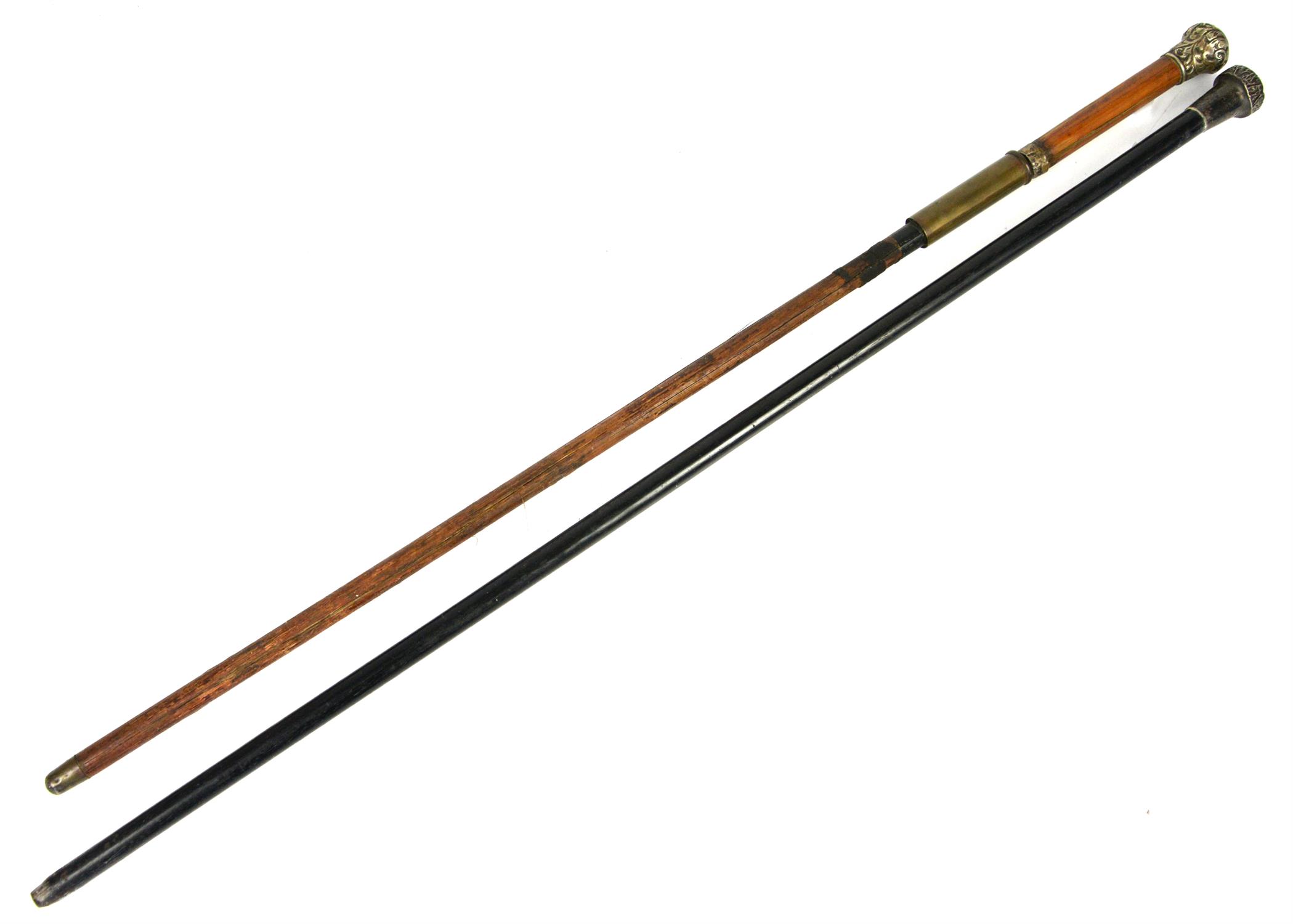 Early 20th century sword stick with bamboo scabbard, white metal top and silver collar marked