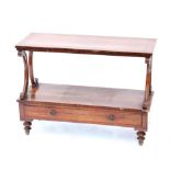 19th century rosewood two tier whatnot, with scrolling supports above a single long drawer on