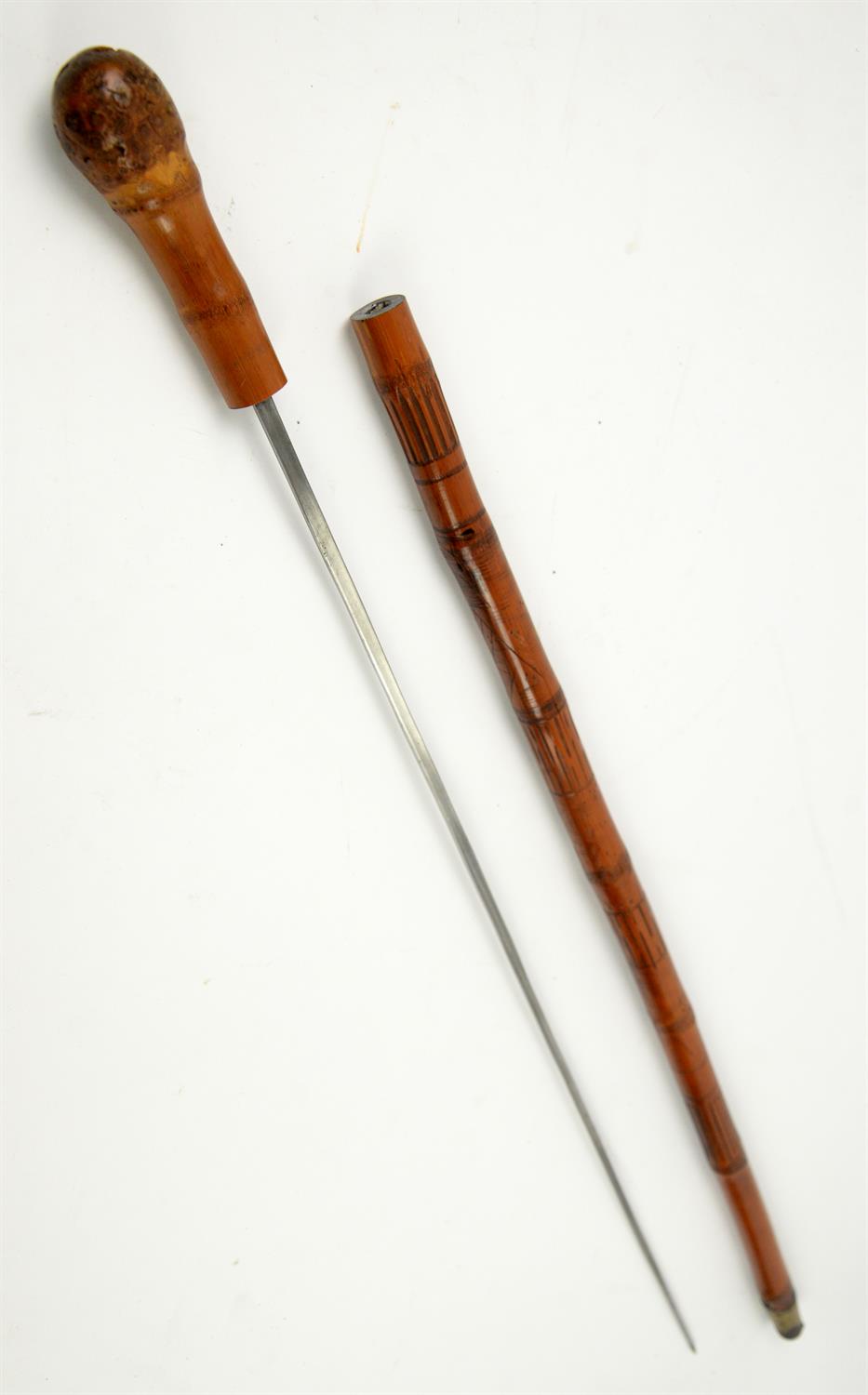 Early 20th century bamboo swordstick, the sheath carved with Oriental ladies, 93cm long, - Image 2 of 2