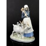 Royal Copenhagen goat girl no.694, printed painted and impressed marks to base, h24cm