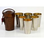 Nest of six picnic steel stacking beakers in brown leather case, the cups marked A & N for Army and