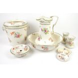 Victorian wash stand set with floral decoration on a cream ground, jug 36cm high,