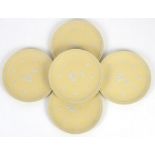 Five Wedgwood Primrose Yellow Jasperware Prunus plates, 20.5cm diam