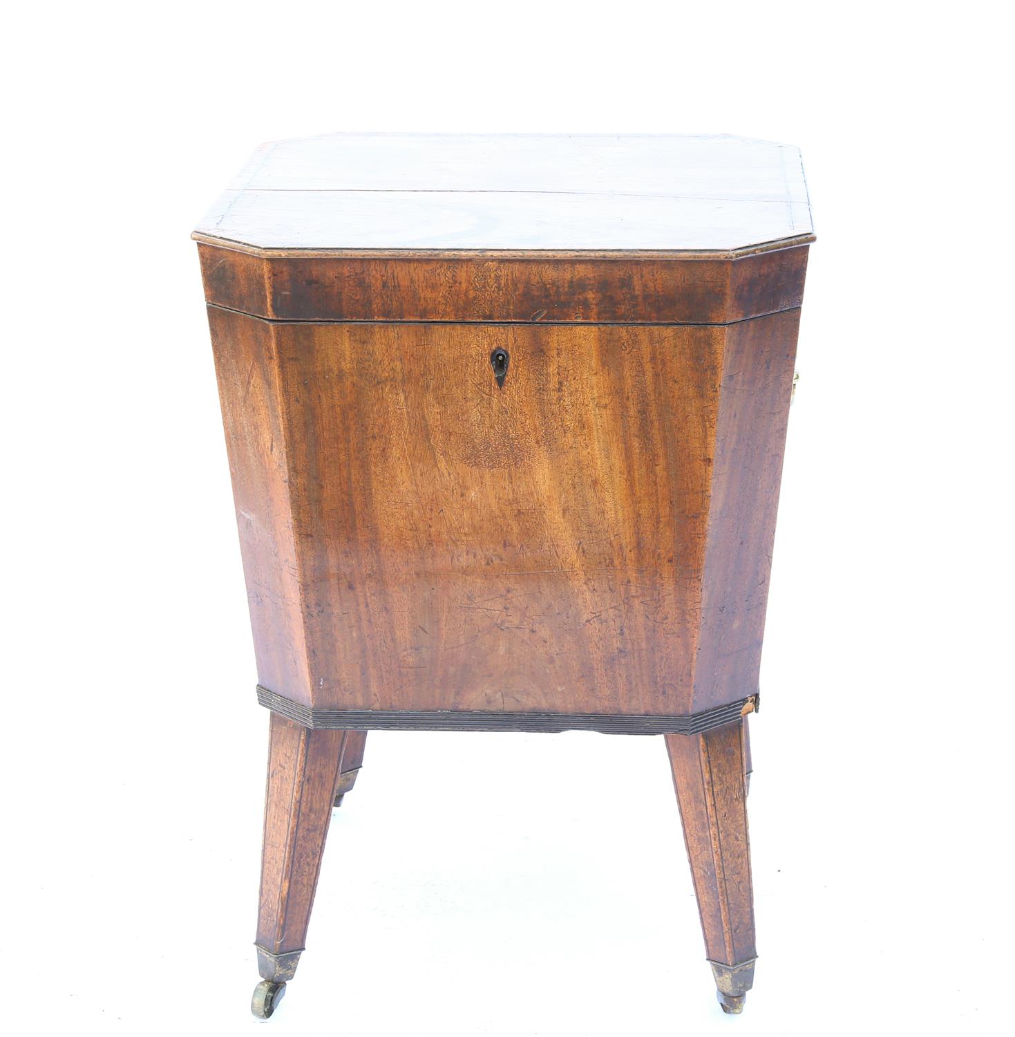 19th century mahogany cellarette, the hinged top opening to reveal a fitted interior,