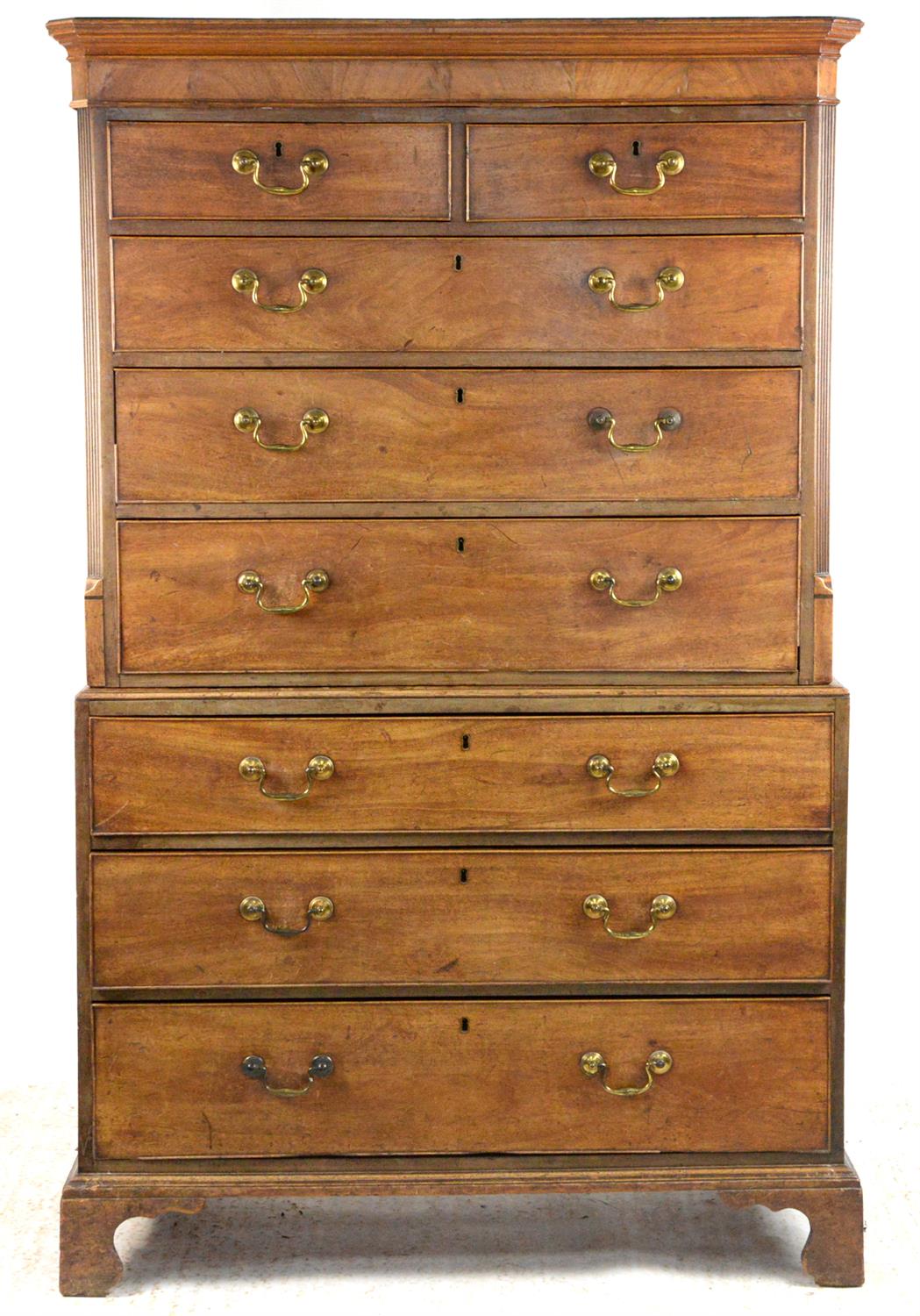 Mahogany tallboy of two short over six long drawers, on bracket feet, h172cm x w106cm x d56cm,