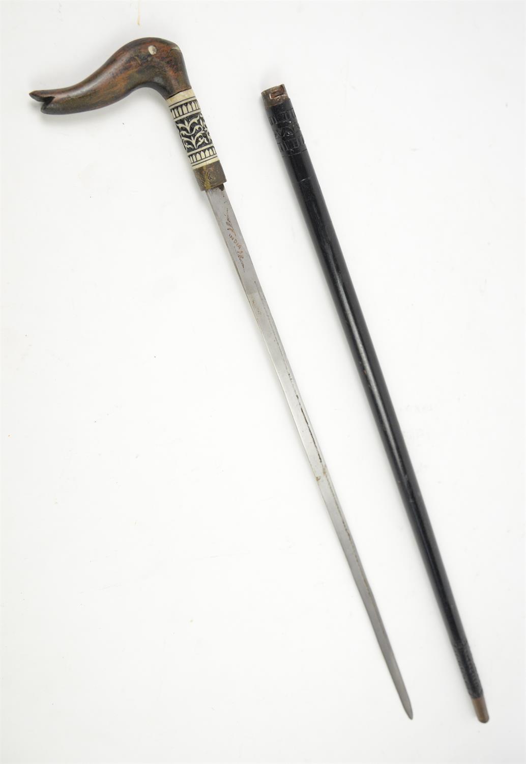 Late 19th century ebonised and bone mounted Indian swordstick with carved hardwood handle, - Image 2 of 2