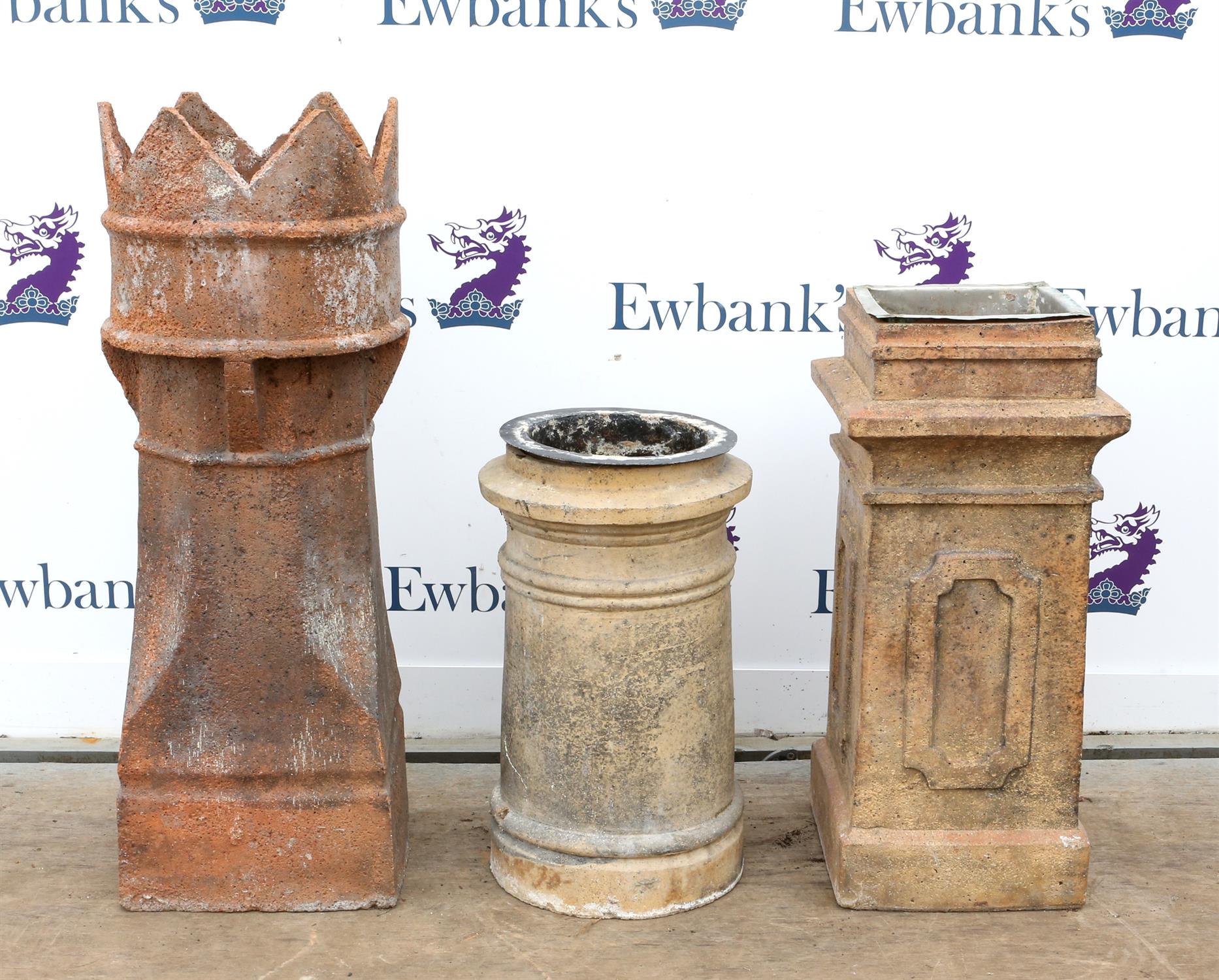 Terracotta chimney pot with crown finial, H94cm, together with two other chimney pots,