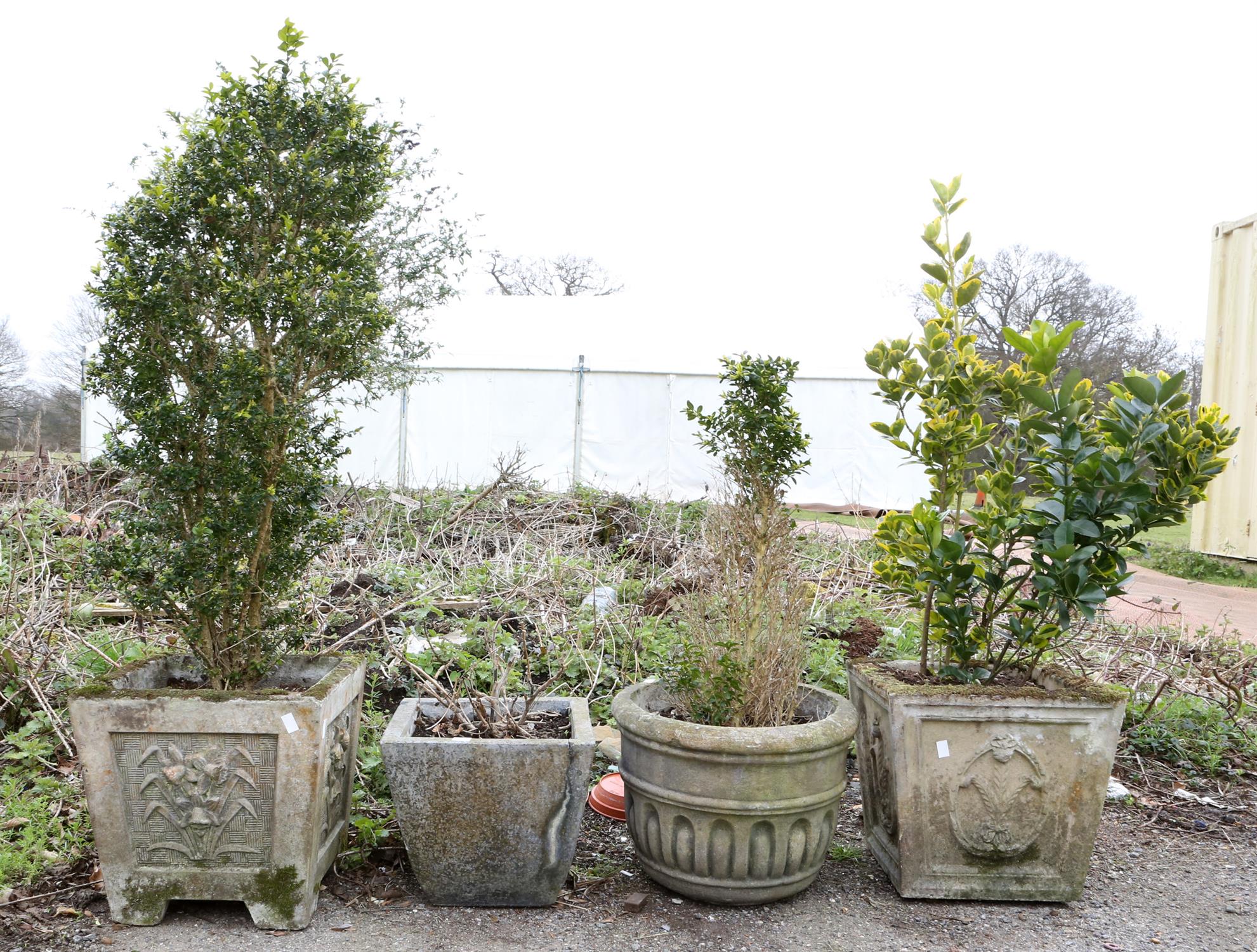 Four composite stone garden planters, to include a square tapering planter, H34 x W35 x D36cm,